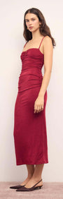 Red Slinky Midi Dress showcasing a figure-hugging silhouette in a rich wine hue with delicate spaghetti straps.