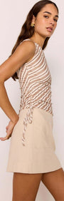 Beige A-Line Cotton/Linen Blend Mini Skirt paired with a stylish striped top, showcasing a casual summer outfit.