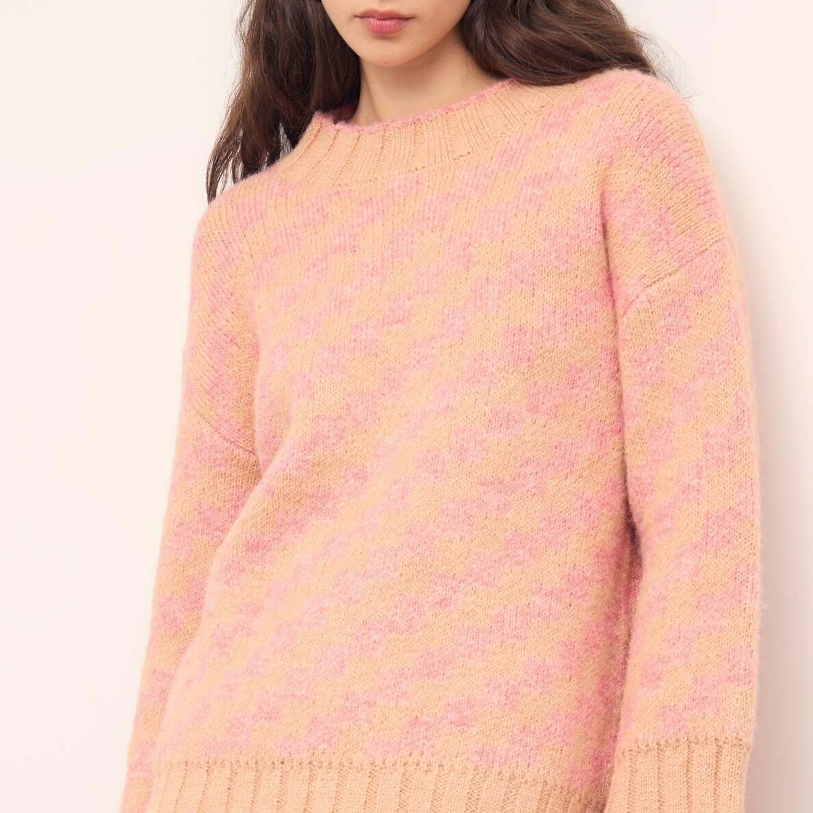 Model wearing a Pink Contrast Chunky Knit Jumper, showcasing its oversized fit and ribbed trims.