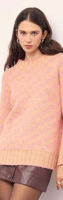 Model wearing a Pink Contrast Chunky Knit Jumper, showcasing its oversized fit and ribbed trims.