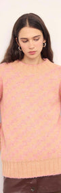 Pink Contrast Chunky Knit Jumper on a model, showcasing relaxed fit and soft peach color.