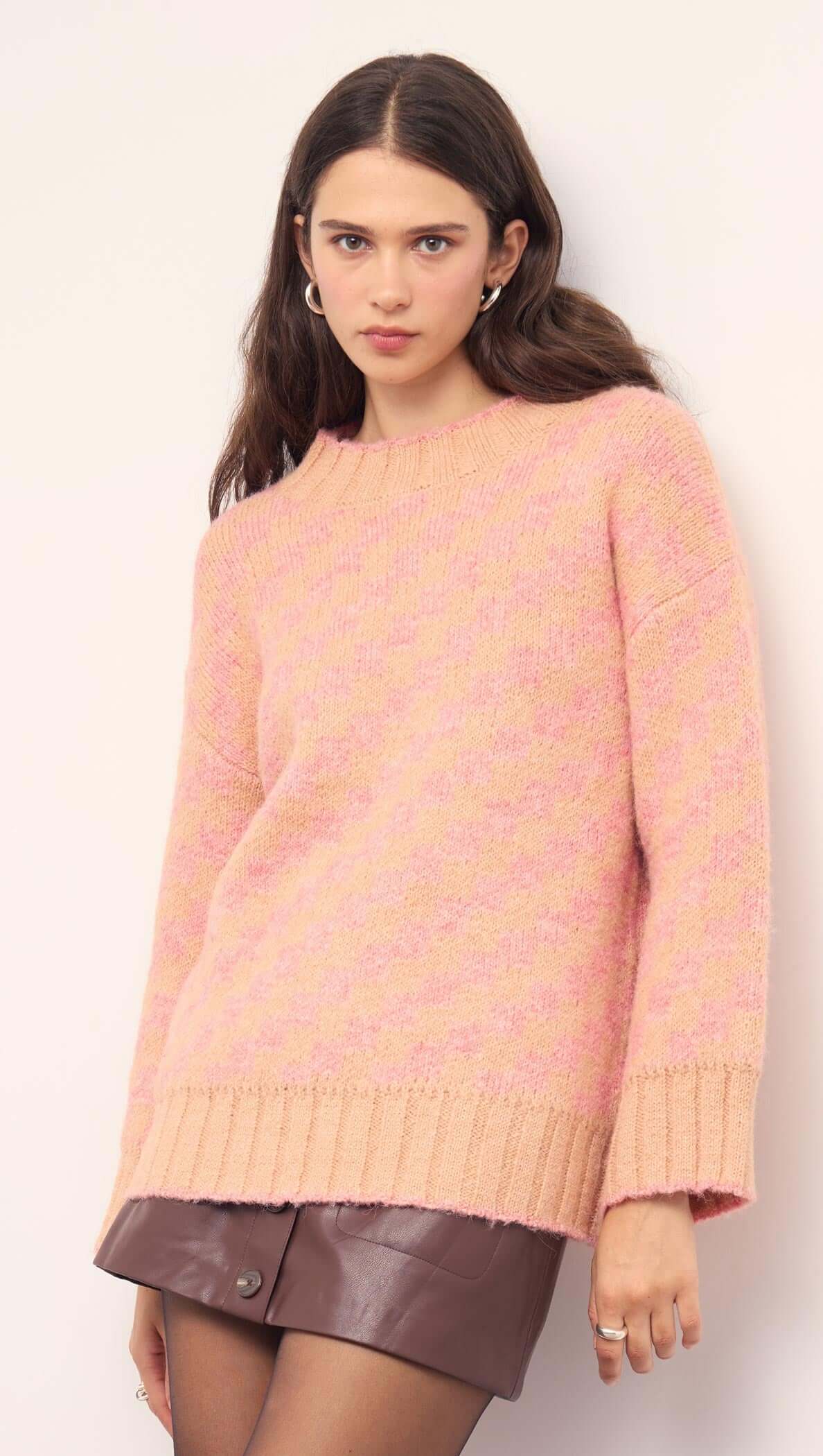 Model wearing a Pink Contrast Chunky Knit Jumper, showcasing its oversized fit and ribbed trims.