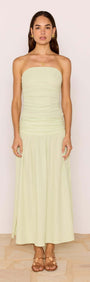 Pistachio Side Split Maxi Skirt styled with a matching strapless top on a model.