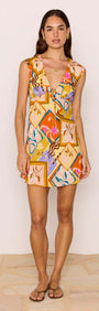 Bold Scarf Print Mini Dress in vibrant colors with plunging neckline and playful design, perfect for summer.