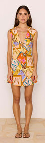 Bold Scarf Print Mini Dress worn by a model, showcasing its vibrant print and flattering mini silhouette.