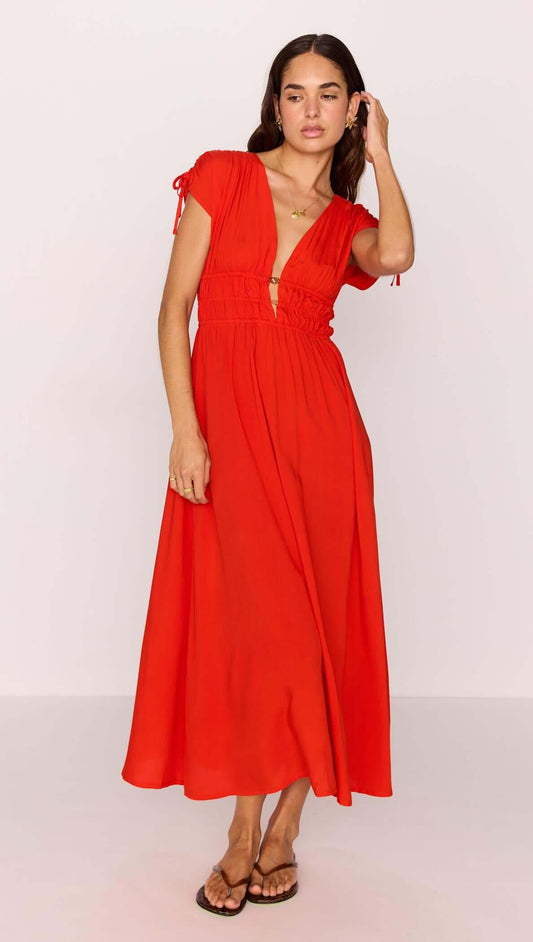 Scarlett V-Neck Midi Dress with Bead Detail in vibrant poppy red worn by a model with sandals.