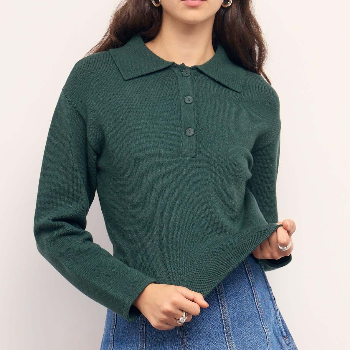 Model wearing a Teal Green Knit Polo Sweater with structured collar and button-up neckline, paired with a denim mini skirt.