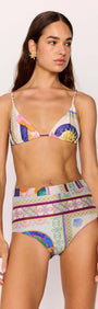 Model wearing a multicolour printed triangle bikini top with tie-back paired with high-waisted bikini bottoms.