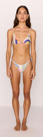 Model wearing a multicolour printed triangle bikini top with tie-back and matching bottoms, showcasing a stylish swimwear look.