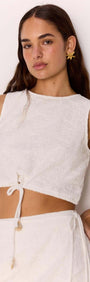 Model wearing the White Tie-Waist Crop Top with adjustable tie detail for a flattering fit.
