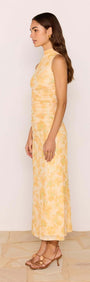 Yellow Floral Mesh Midi Dress showcased on a model, featuring soft ruching and a high neckline in a vibrant yellow floral print.