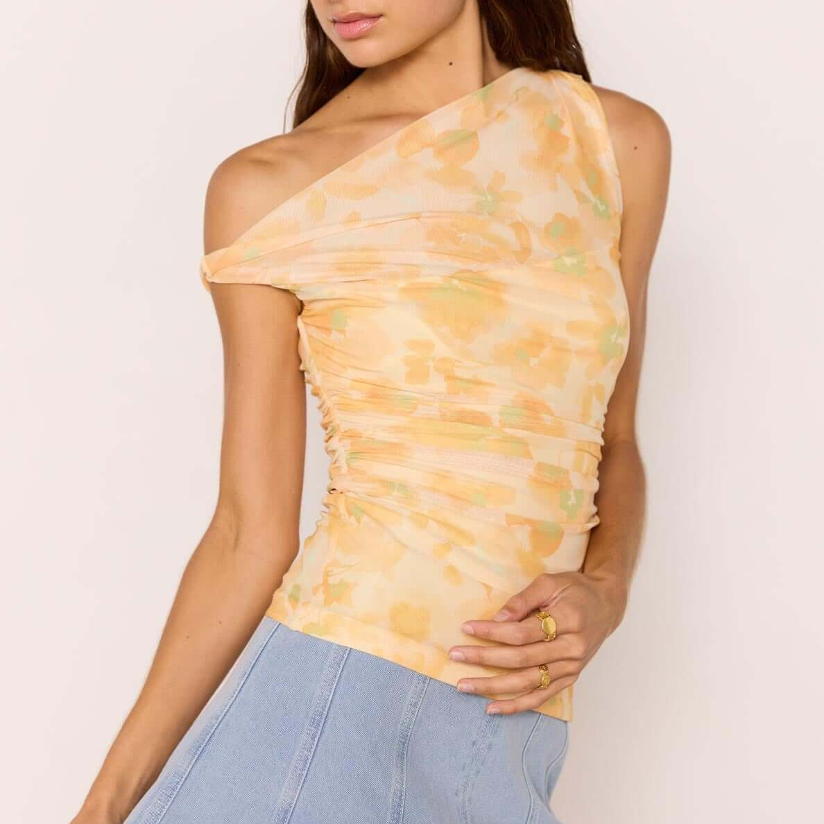 Yellow Floral Mesh Top featuring one-shoulder design and orange watercolour floral print with ruched body.