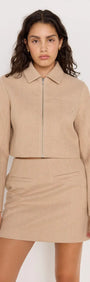 Audrey Herringbone jacket in brown shade, zipped with collar, paired with matching skirt for a chic look.