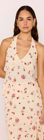 Red & Cream Floral Halter Bias Top worn by model, showcasing vintage-inspired floral print and halter neckline.