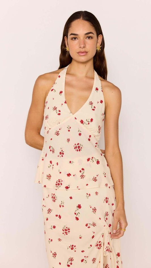 Red & Cream Floral Halter Bias Top worn by model, showcasing vintage-inspired floral print and halter neckline.