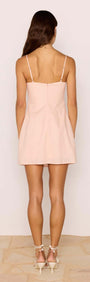 Dusty Pink Linen Mini Dress With Bead Detail - Back view showing adjustable straps and A-line silhouette.