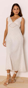 Lace Detail White Cotton Midi Dress worn by model, featuring a plunging V-neckline and lace trim on a neutral background.