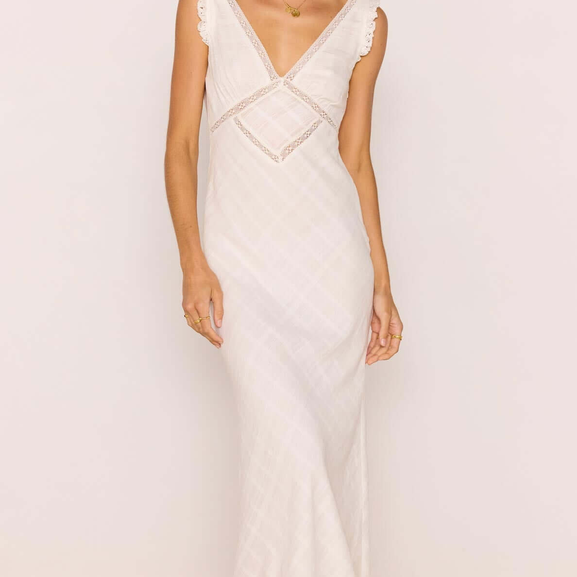 Lace Detail White Cotton Midi Dress with plunging V-neckline and lace trim, perfect for summer events.