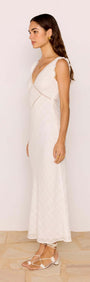 Lace Detail White Cotton Midi Dress side view showcasing its plunging V-neckline and lace trim.
