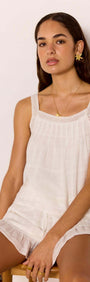 Lace Detail White Cotton Top model wearing a relaxed fit summer top with lace trim and soft viscose lining.