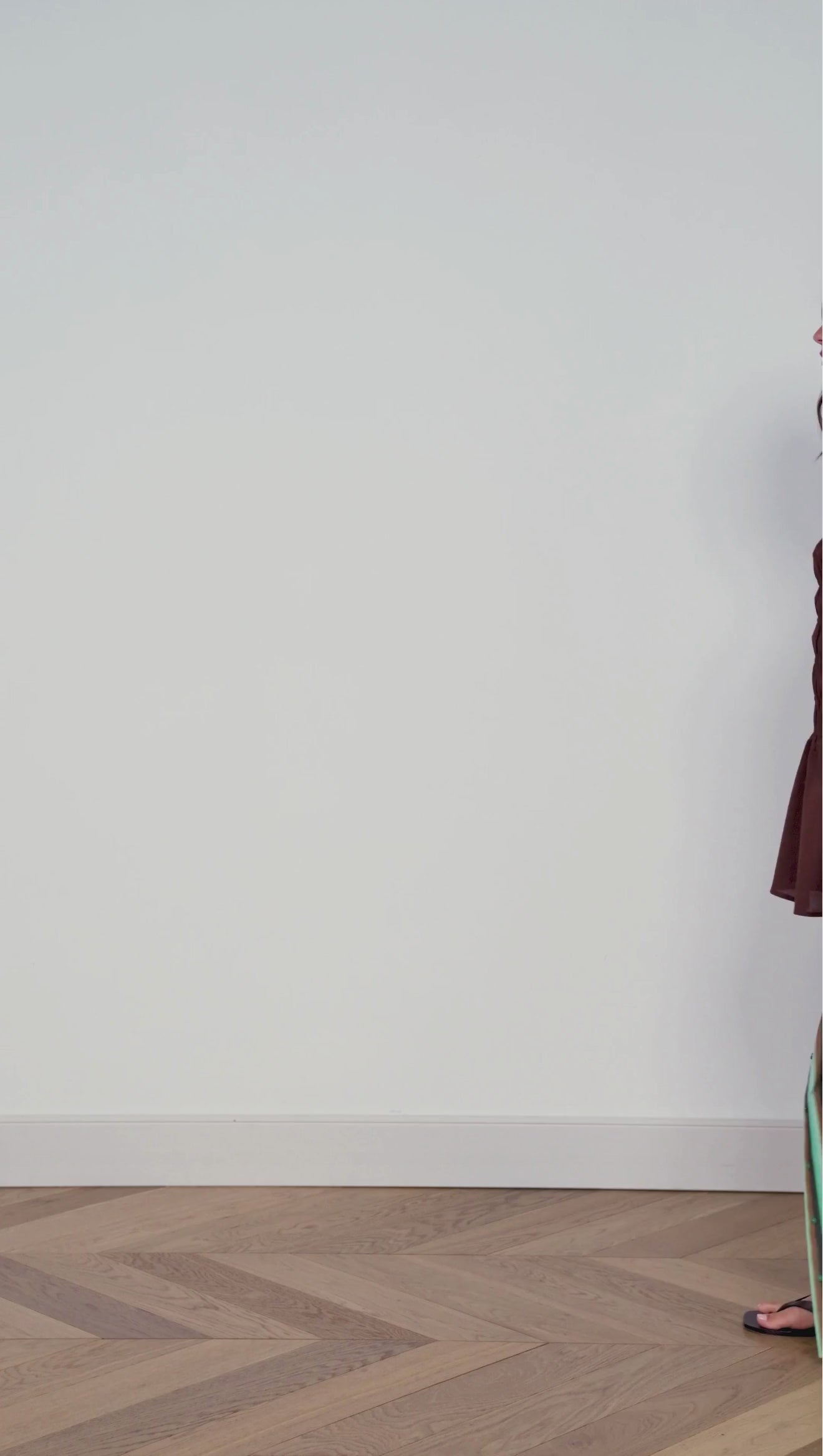 Model wearing the Green Stripe Cotton Oversized Shirt paired with matching shorts against a minimalistic backdrop.