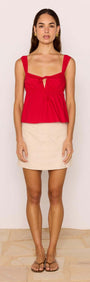 Red Cotton Linen Blend Tie-Front Top worn with a beige mini skirt, showcasing a playful and chic summer outfit.