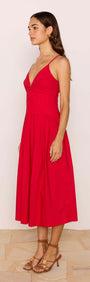 Red Cotton Linen Blend V-Neck Midi Dress displayed on a model, showcasing its elegant A-line silhouette and plunging neckline.