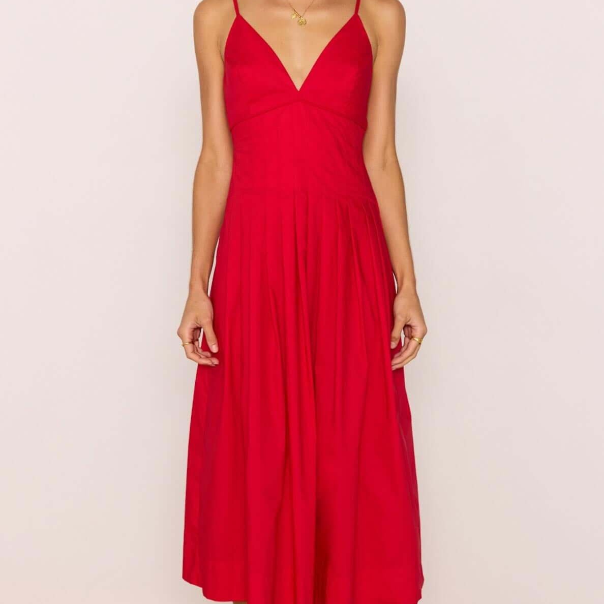 Red Cotton Linen Blend V-Neck Midi Dress on a model, showcasing its elegant fit and vibrant red color.