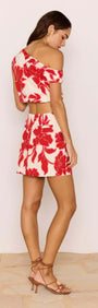 Red & White Floral Linen Blend Asymmetric Crop Top paired with a matching mini skirt, showcasing a bold floral print.