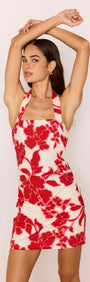 Red & White Floral Linen Blend Halter-Neck Mini Dress showcased by a model with arms raised, perfect for summer fashion.